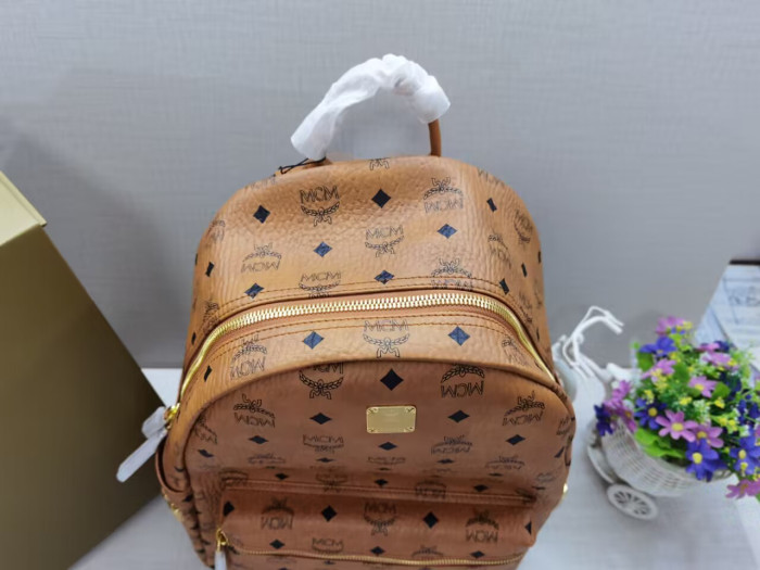 MCM backpack 13"W x 16"H x 5"D